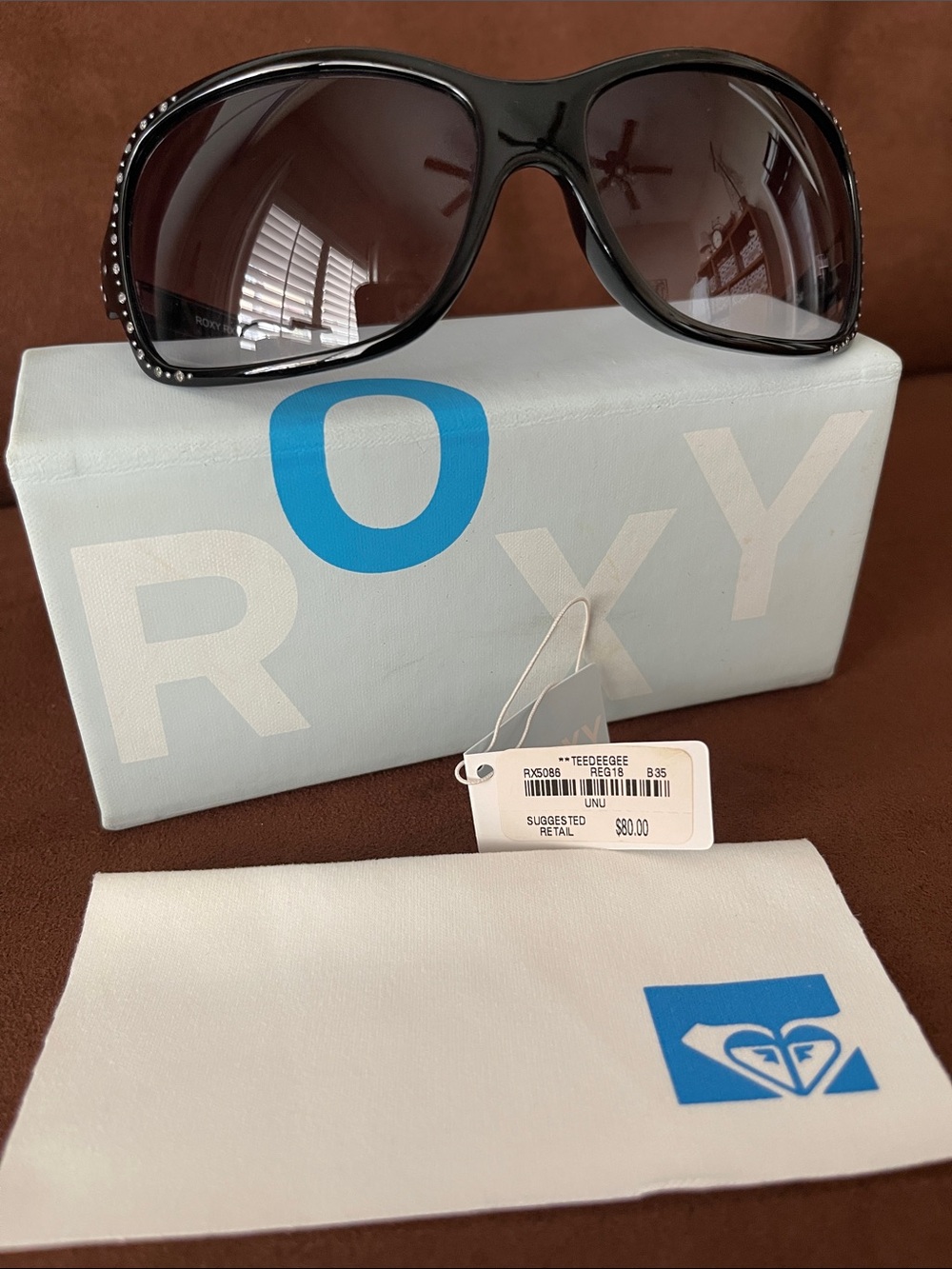 Roxy Black Frame Sunglasses with Brown Gradient Lenses